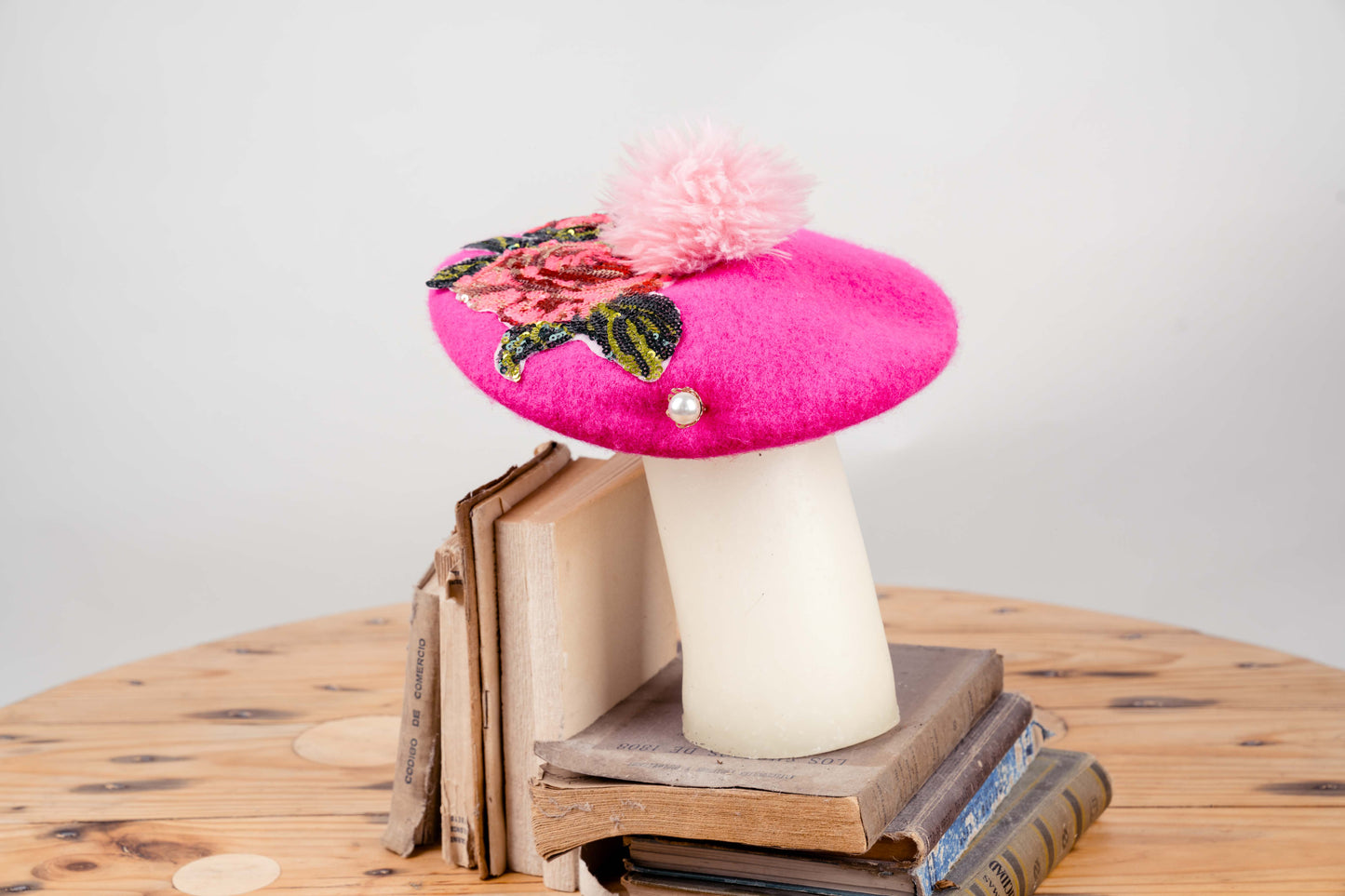 Vibrant Pink Beret with Floral Embellishments and Pom-Pom Accent